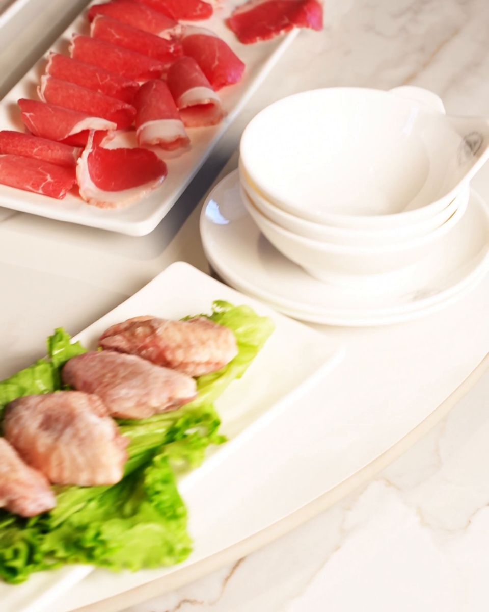 A plated spread of sliced meats for the table